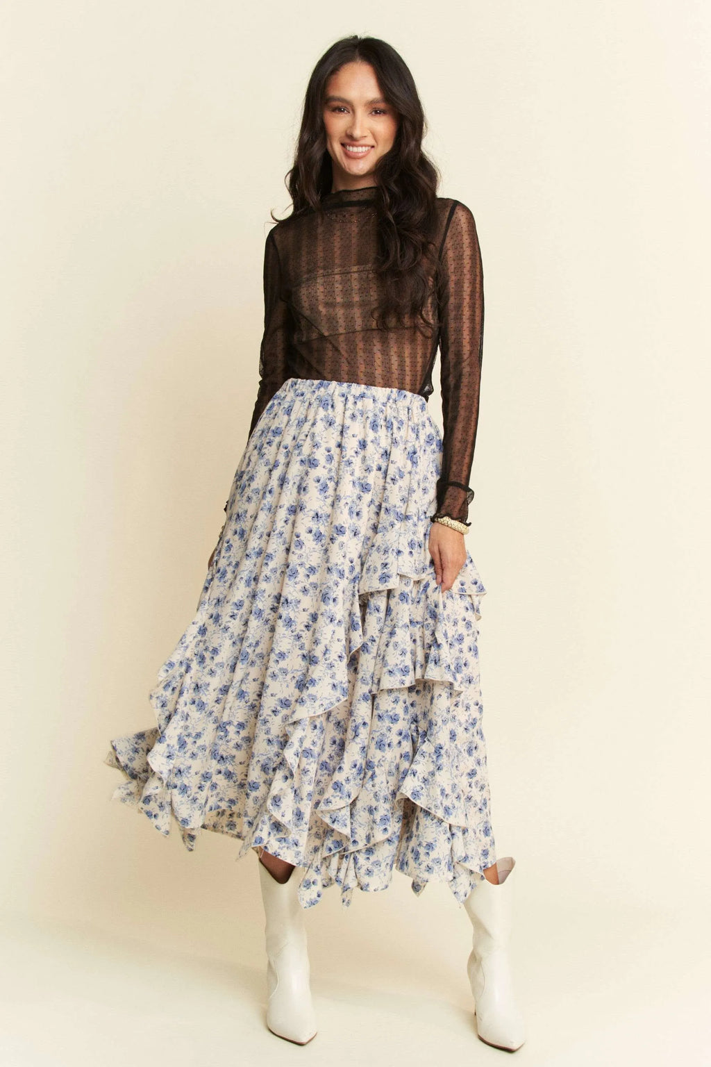 Front view of black sheer dotted mesh turtleneck lace top with long sleeves