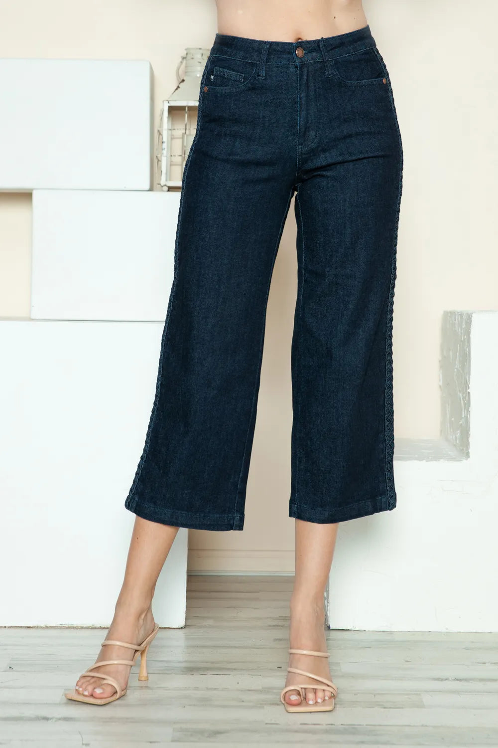 Dark full-size crop wide-leg jeans with side-seam braid detail and button closure