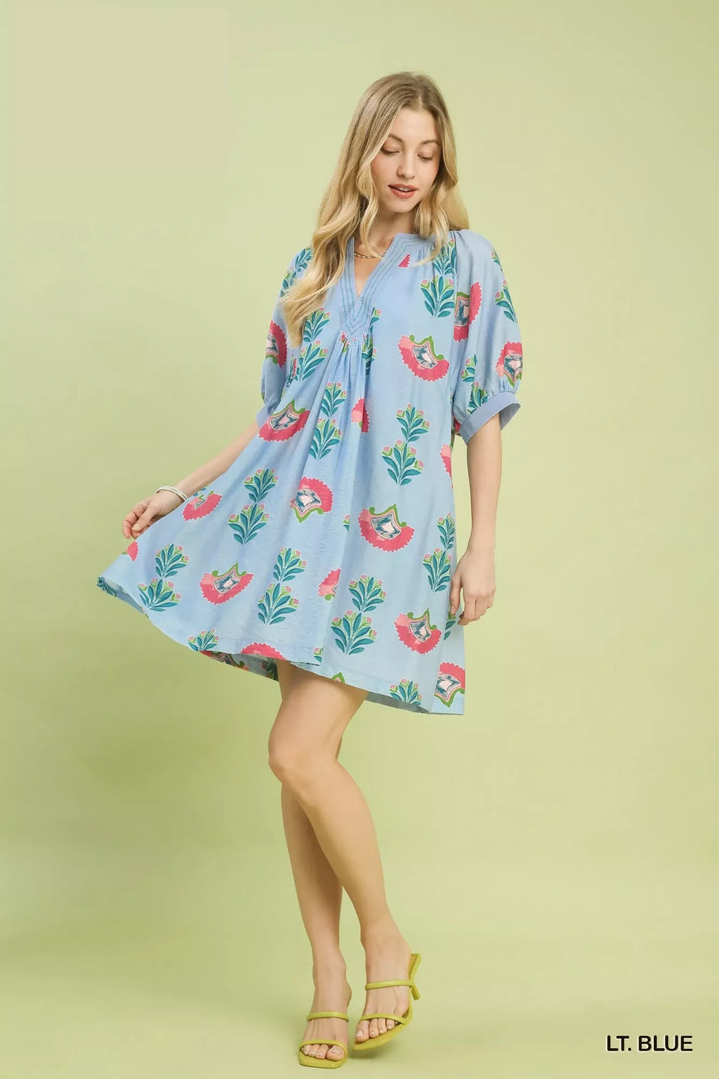 Light blue mini dress with flowy relaxed fit and bird-and-leaf print