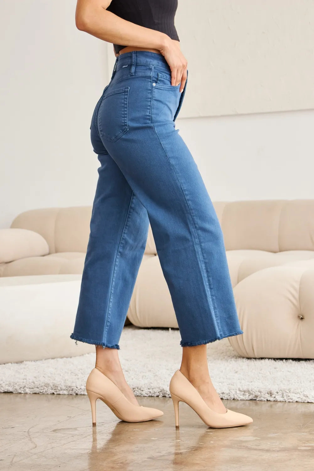Blue Slate high-waist jeans with raw hem crop and tummy-control fit