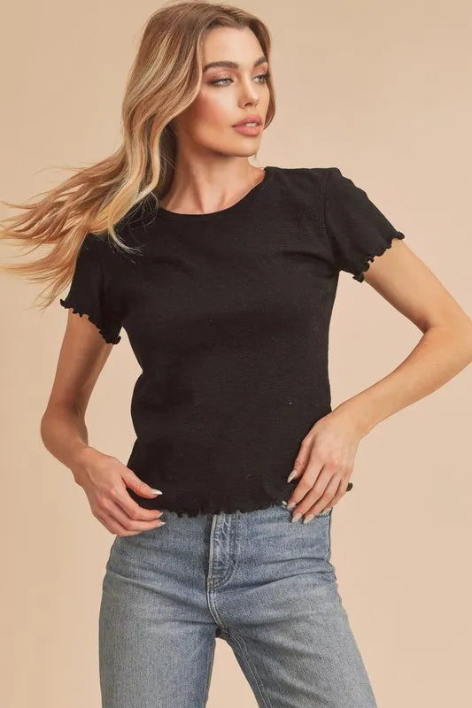 Black short-sleeve tee with round neckline and ruffled lettuce hem