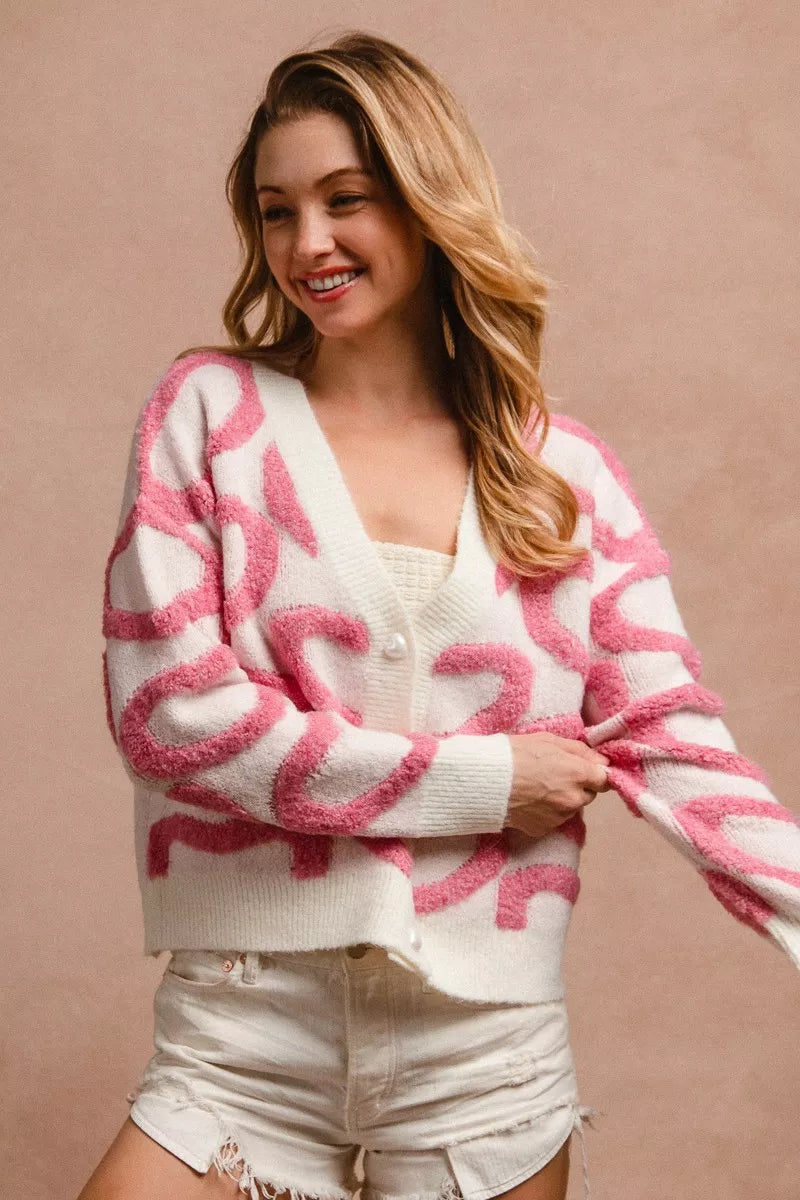 Cardigan V con botones completo, blanco con estampado rosa y manga larga