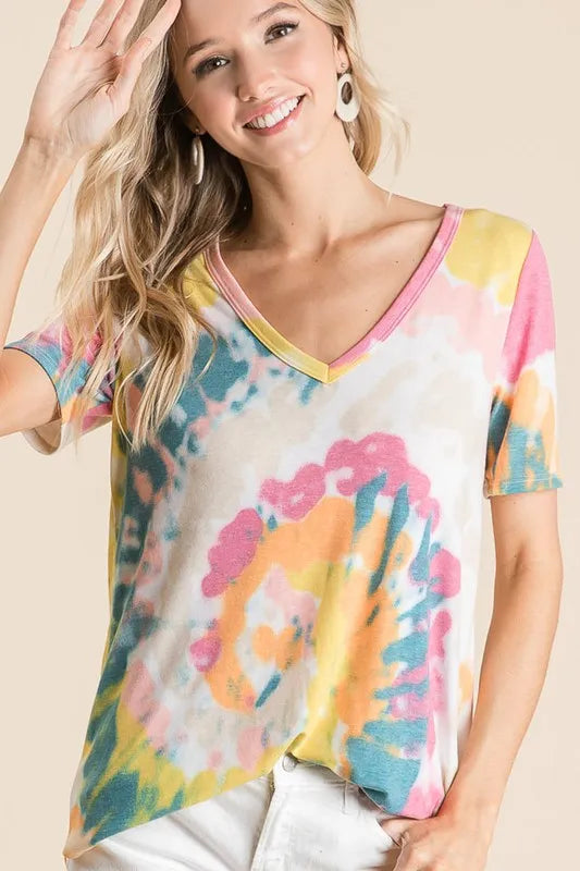 V-neck tie-dye blouse with yellow-orange, teal, and pink pattern; relaxed short sleeves