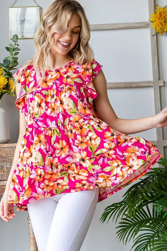 Fuchsia floral tiered babydoll top with flutter sleeves, layered gathered bodice