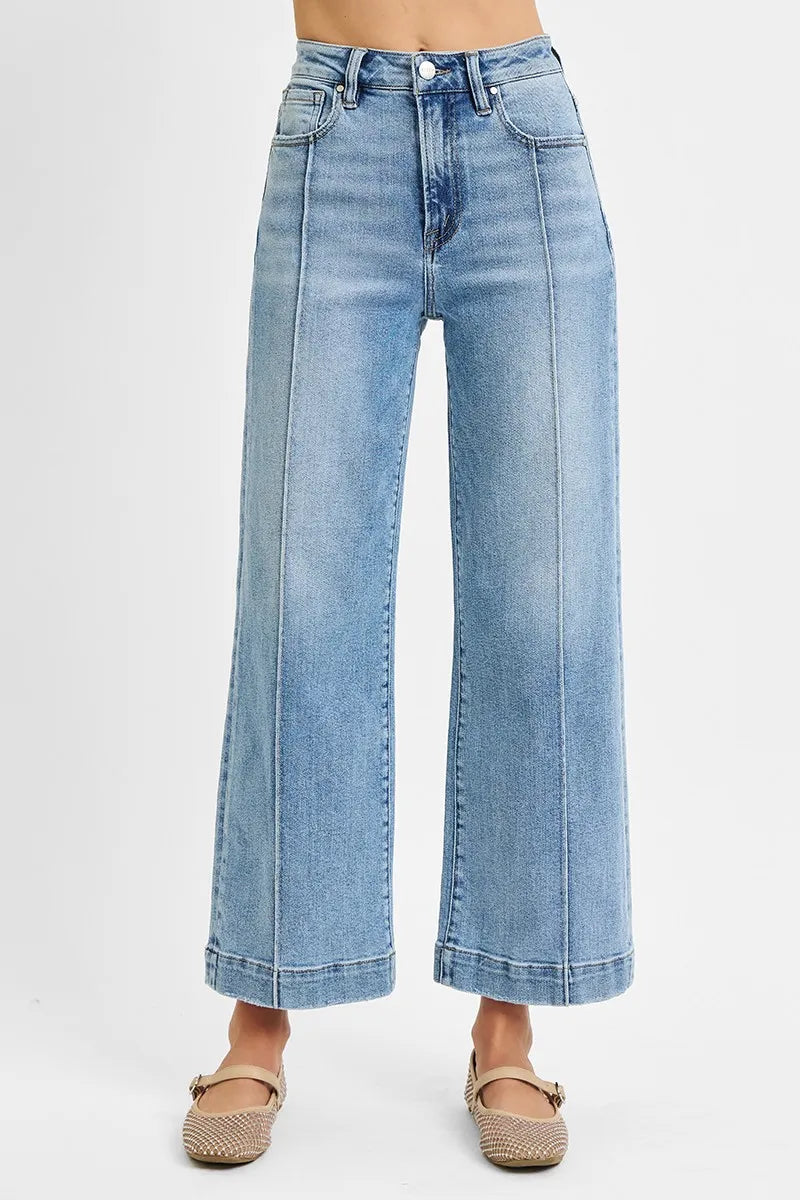 Light-wash high-rise crop wide-leg jeans with button closure and side seams