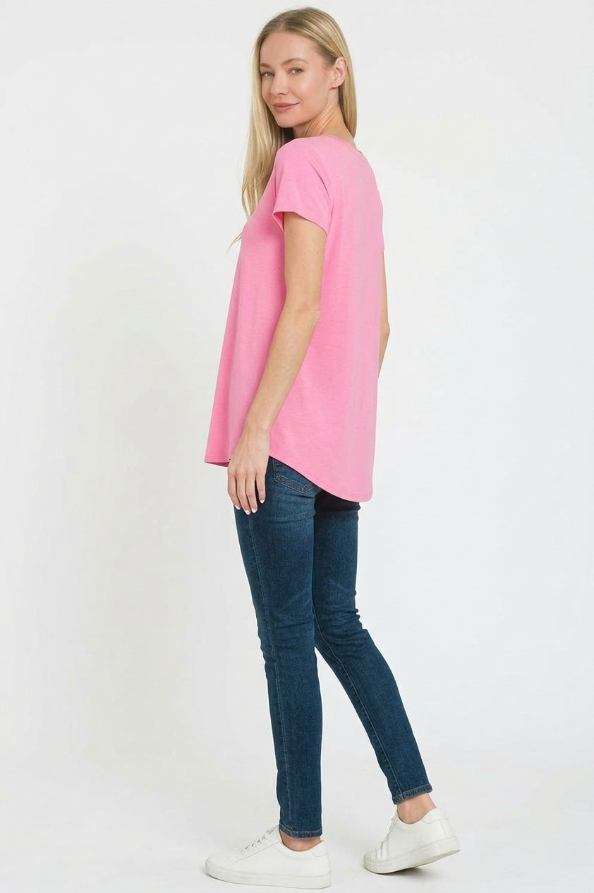 Candy pink V-neck short-sleeve top, side view with rounded hemline