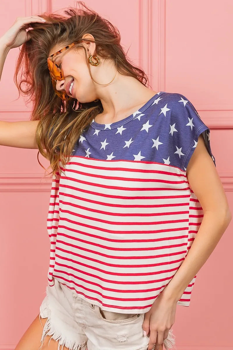 Sleeveless-look navy star and red stripe printed combo top with crew neckline