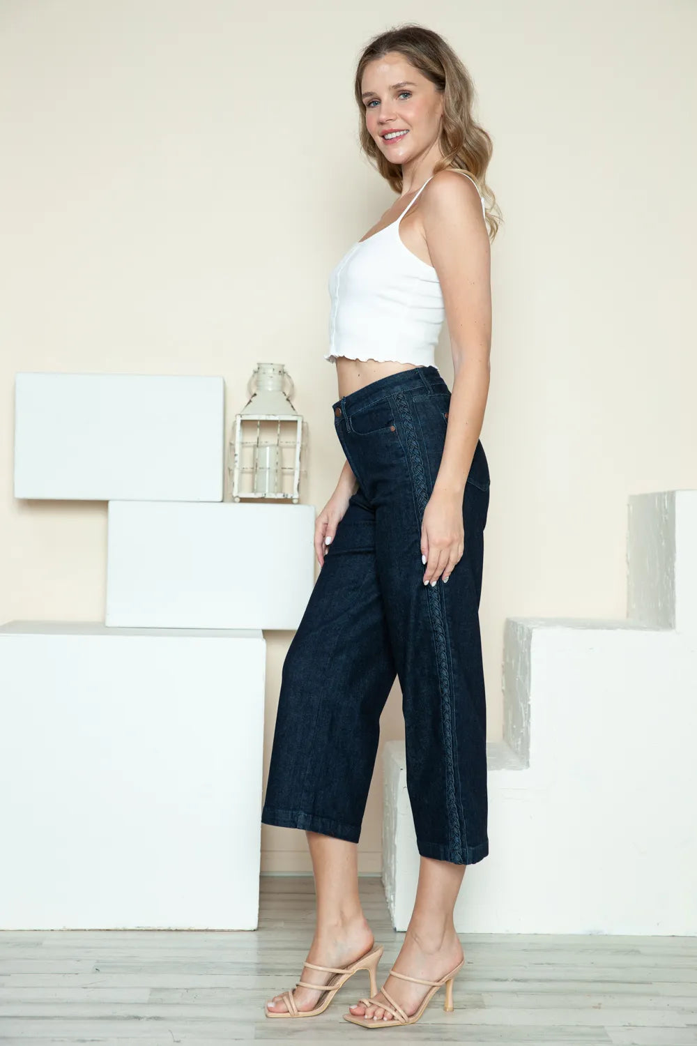 Dark wide-leg crop jeans with front pockets and braided side seam detail