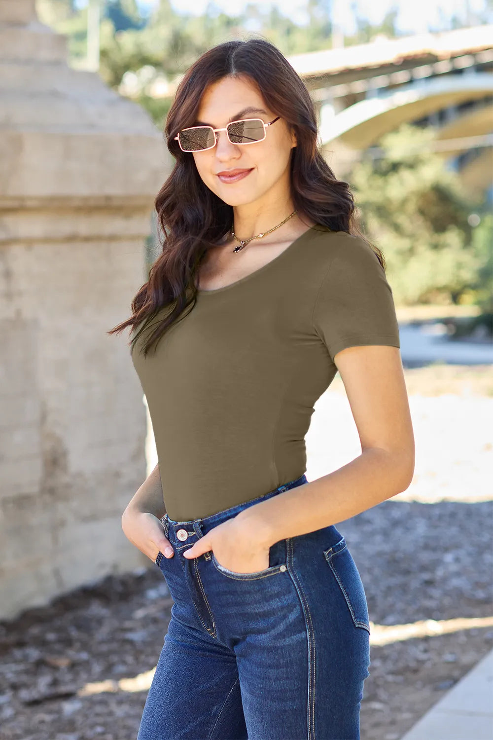 Olive short-sleeve round-neck bodysuit, fitted silhouette