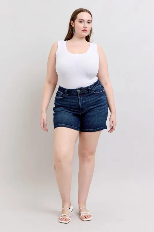High-waist dark denim shorts, front view with belt loops and pockets