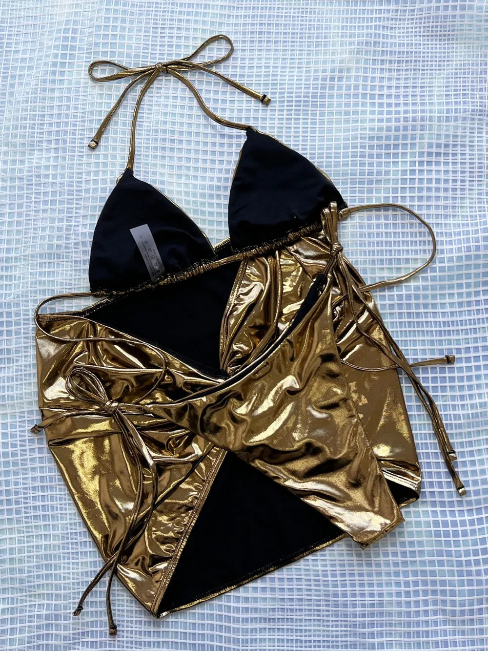 Gold metallic and black tie-string bikini set: triangle top and ruched mini skirt