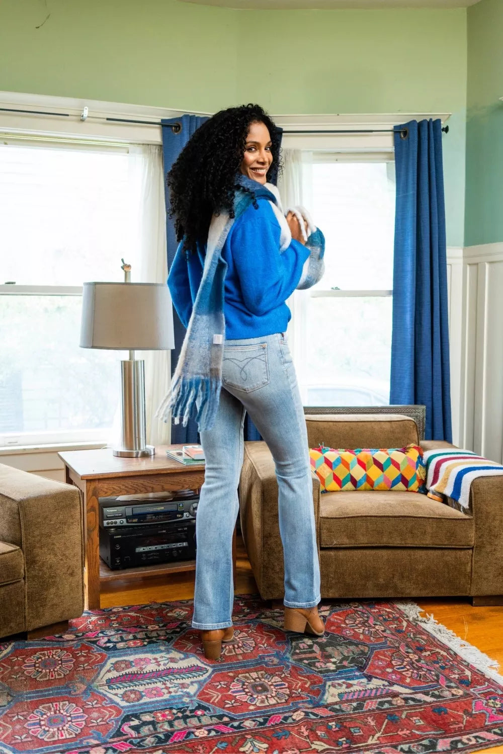 Mid-rise thermal bootcut jeans in light wash with five-pocket styling