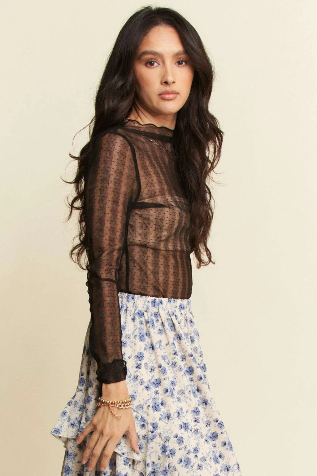 Black dotted sheer mesh turtleneck top, fitted silhouette, long sleeves
