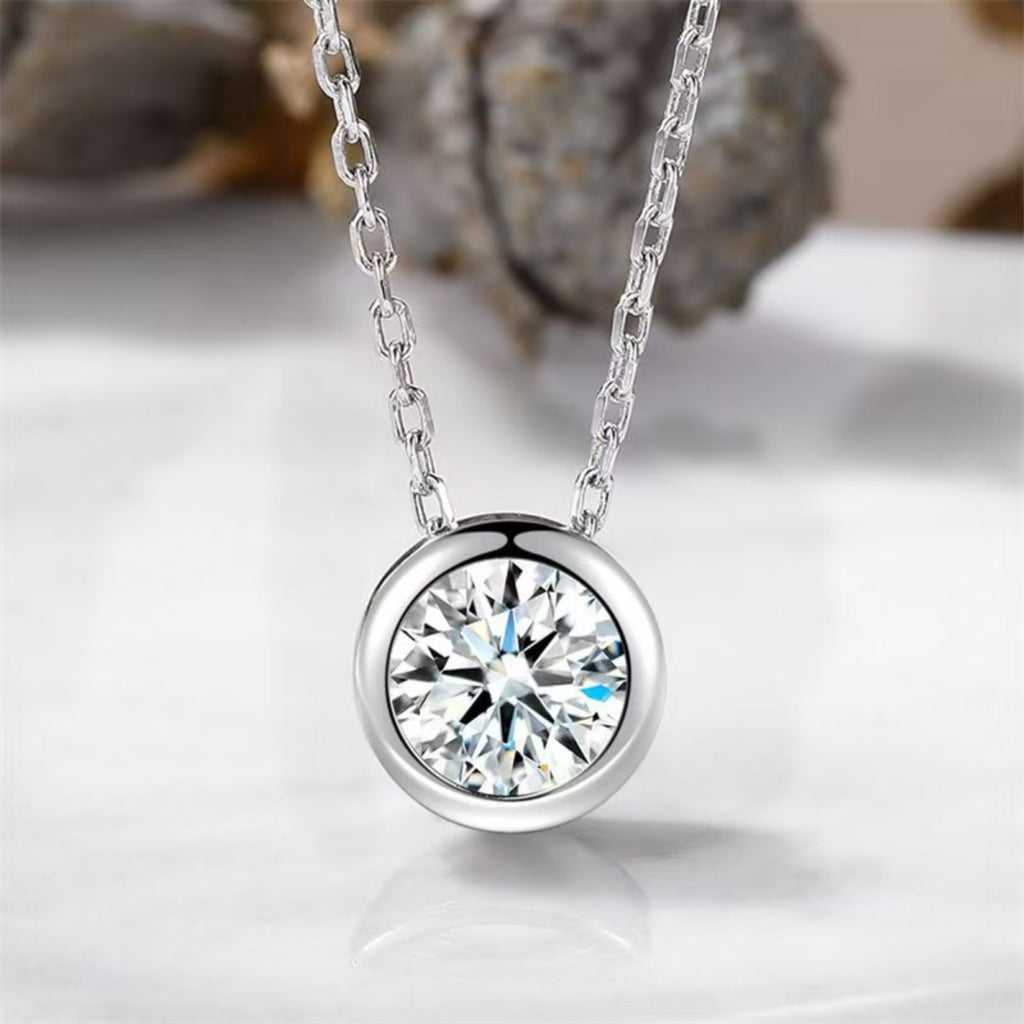 1-carat style round moissanite pendant with prong-style settings, silver chain