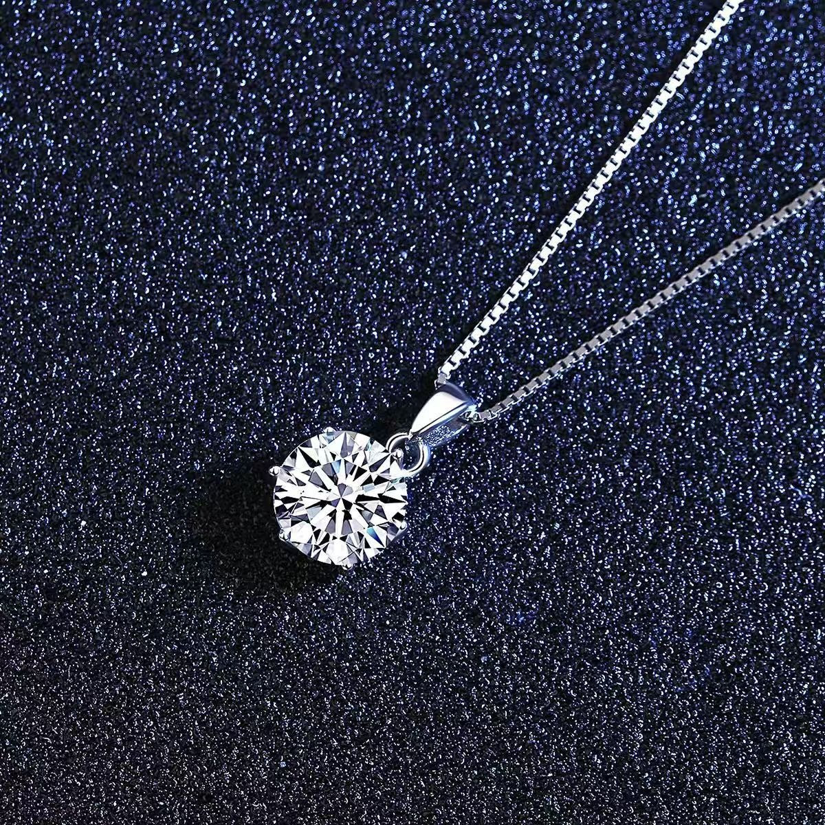 Round moissanite pendant on a silver 925 chain necklace, prong-set center stone