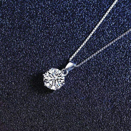 Round moissanite pendant on a silver 925 chain necklace, prong-set center stone