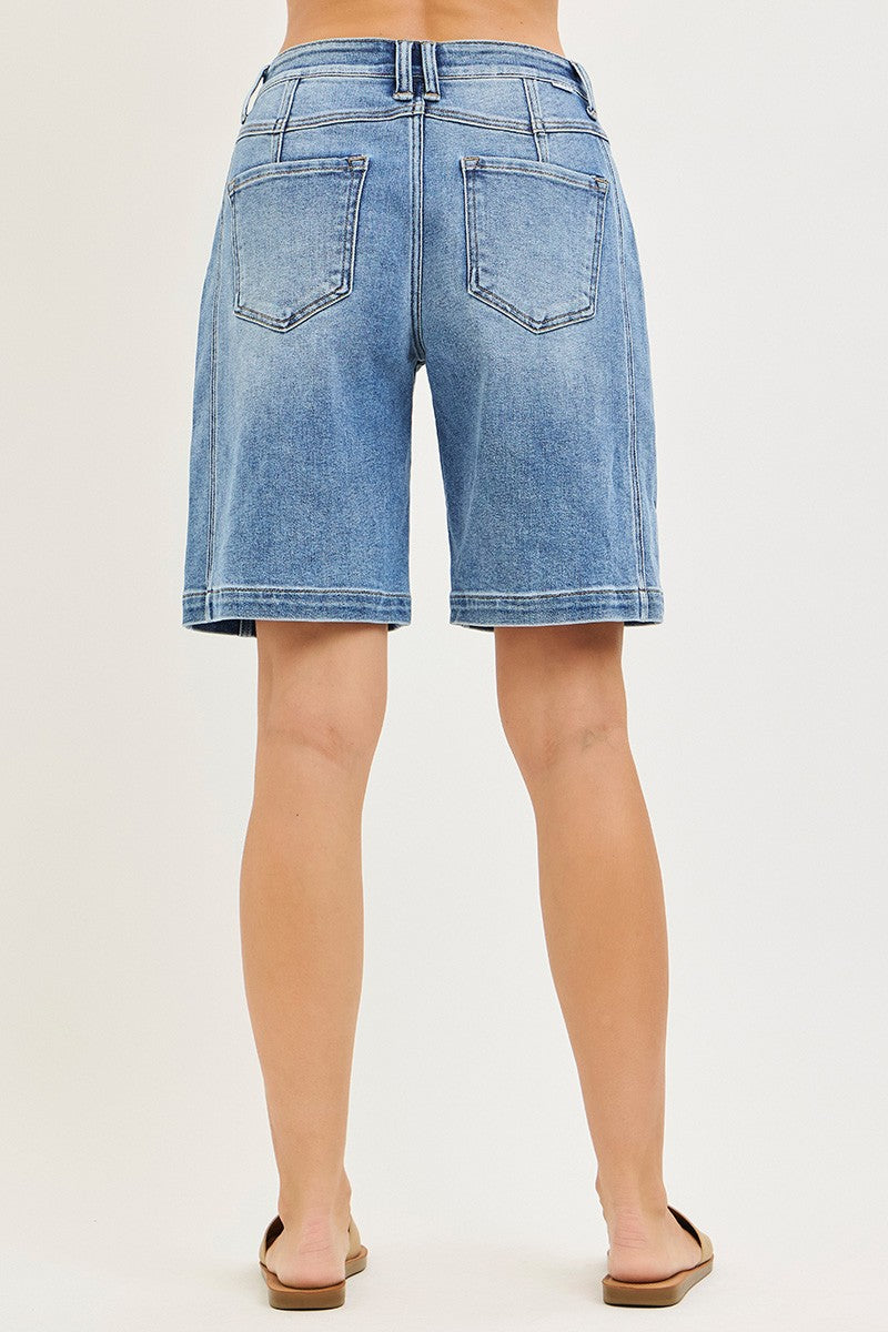 Medium-wash denim jorts back view with two patch pockets
