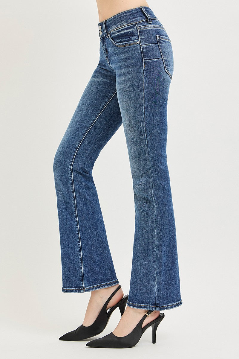 Back view: medium wash bootcut jeans with two rear pockets and yoke stitching