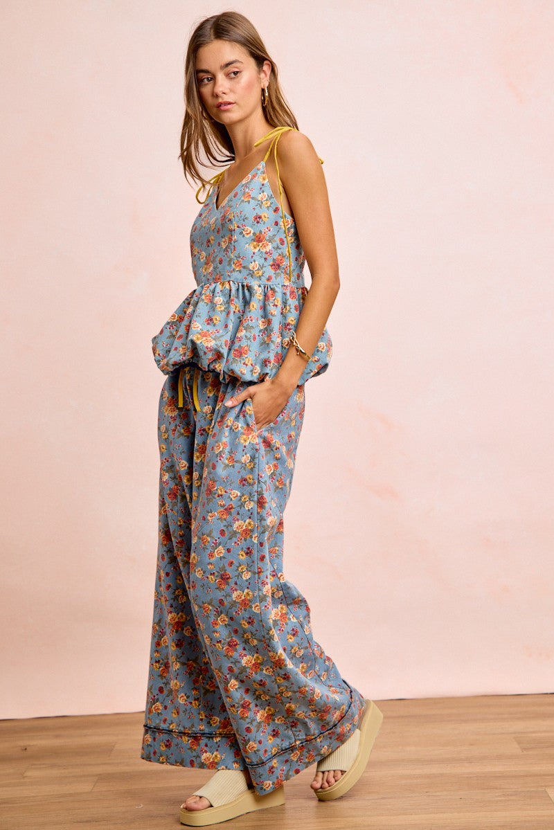 Blue floral wide pants with elastic drawstring waist and billowy wide legs, rolled hems