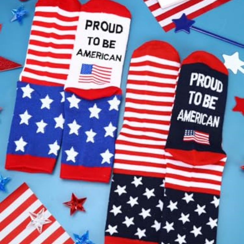 Two pairs of socks with star-and-stripe panels and “Proud to be American” lettering