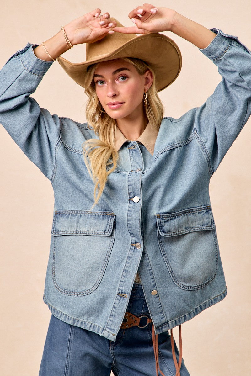 Light wash denim jacket with contrast collar, front buttons and two chest flap pockets.