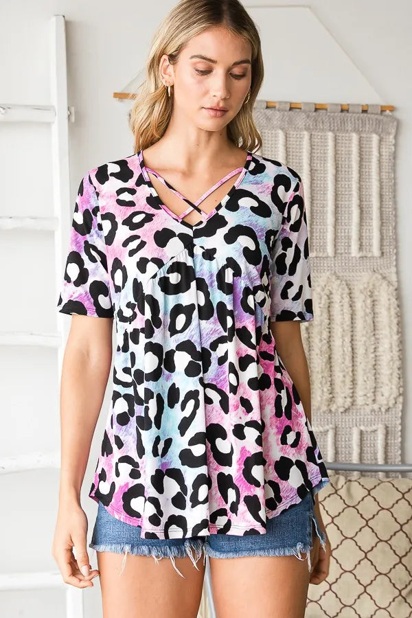 Animal print babydoll top, crisscross neck straps and flowy silhouette, short sleeves