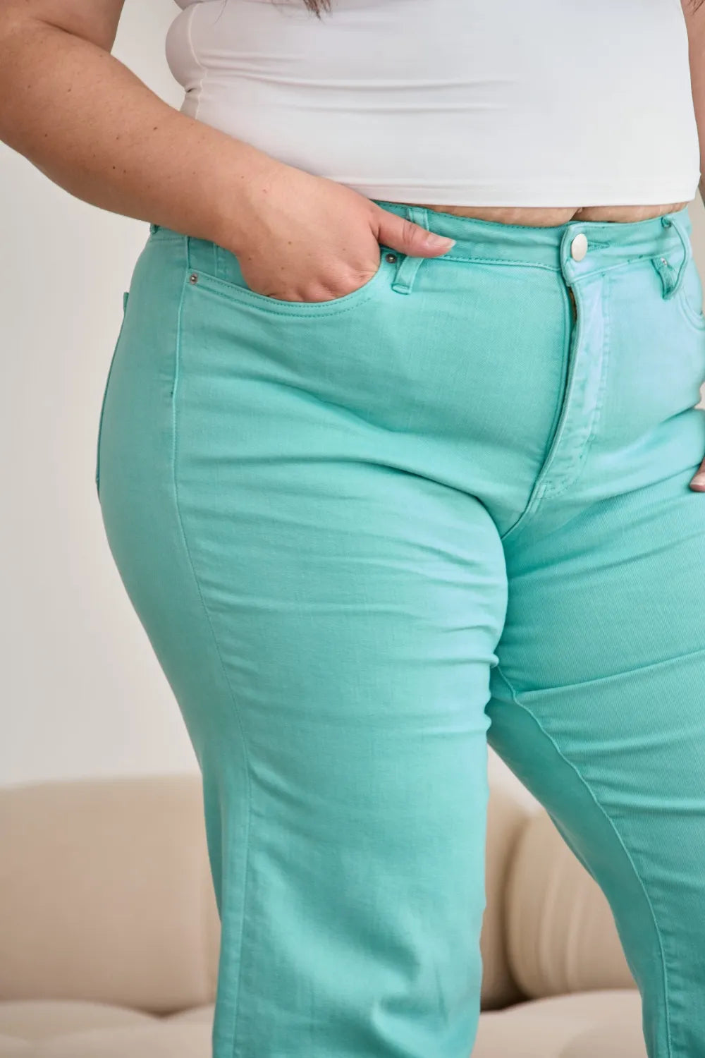 Island Green high-waist raw-hem jeans, five-pocket style detail