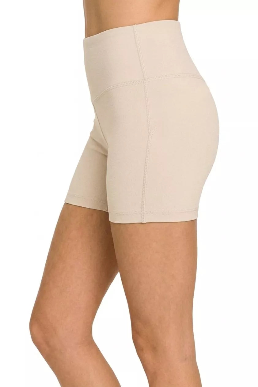 Sand beige microfiber biker shorts with wide waistband and visible seam detailing