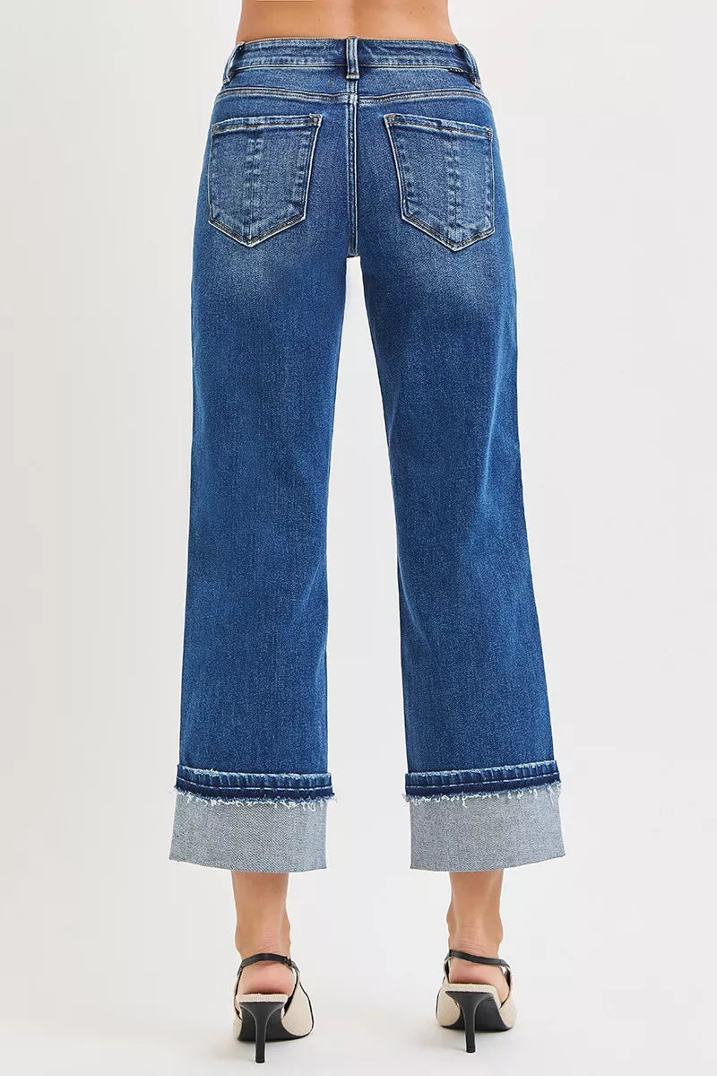 Dark-wash straight jeans, mid rise, cuffed hem at ankles with rear pockets