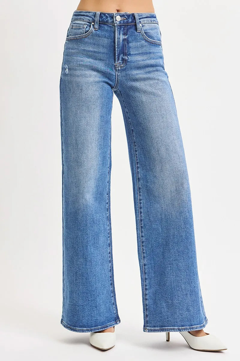 Back view high-rise wide-leg jeans, medium wash blue with belt loops and rear pockets.