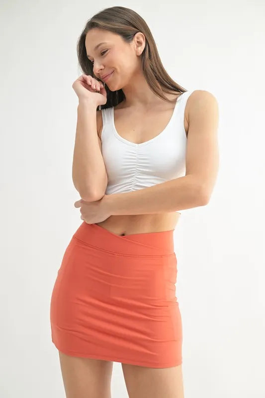 White ruched-front active tank with scoop neckline and slim shoulder straps