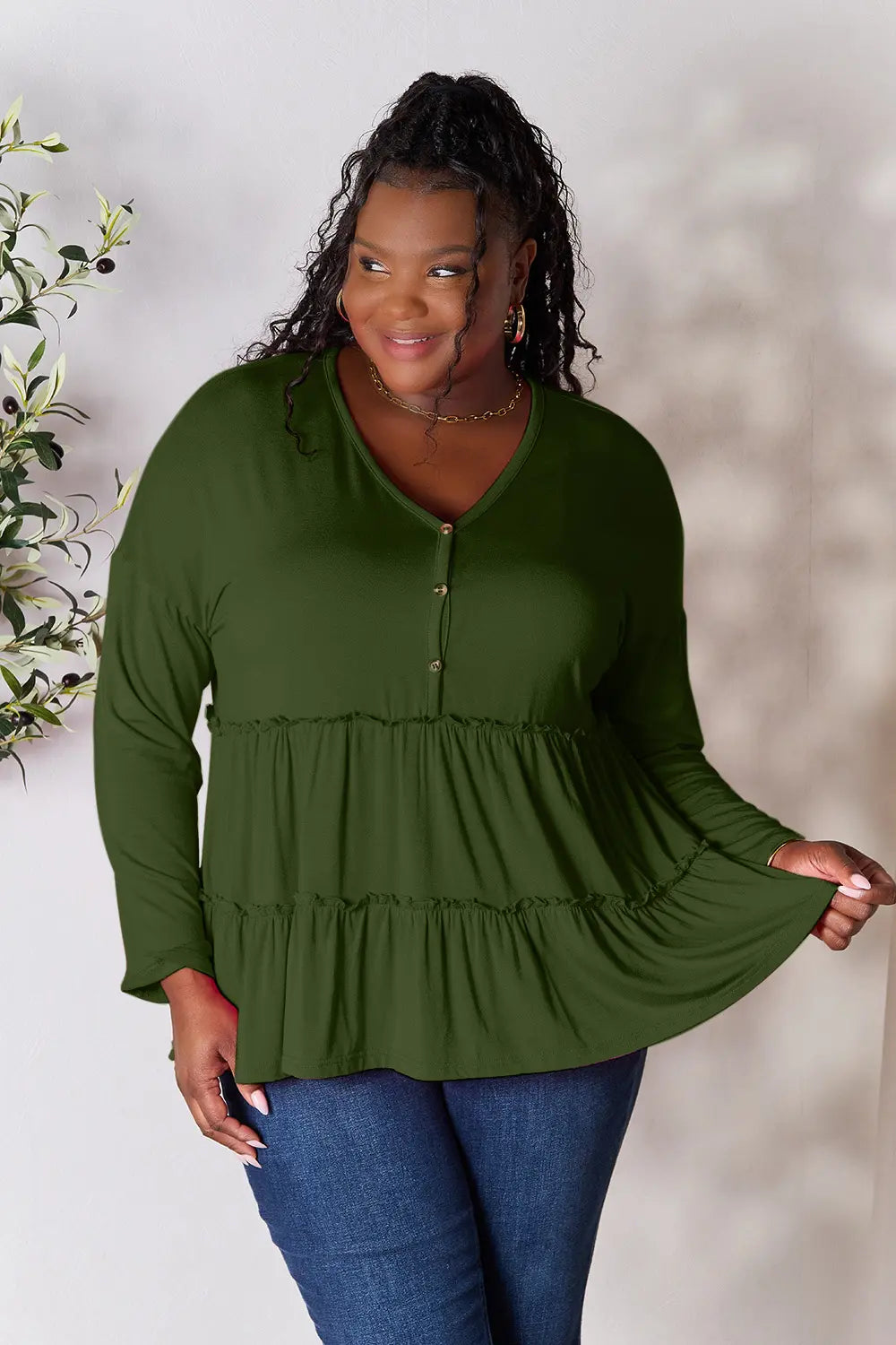 Army green long sleeve blouse with half-button front and ruffle tier hem