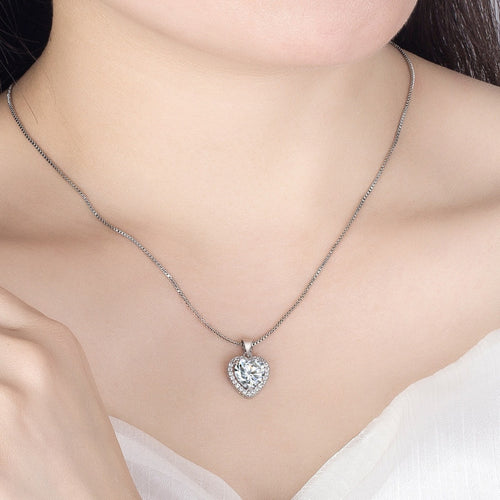 Silver heart moissanite pendant necklace on a chain, heart-shaped stone centerpiece