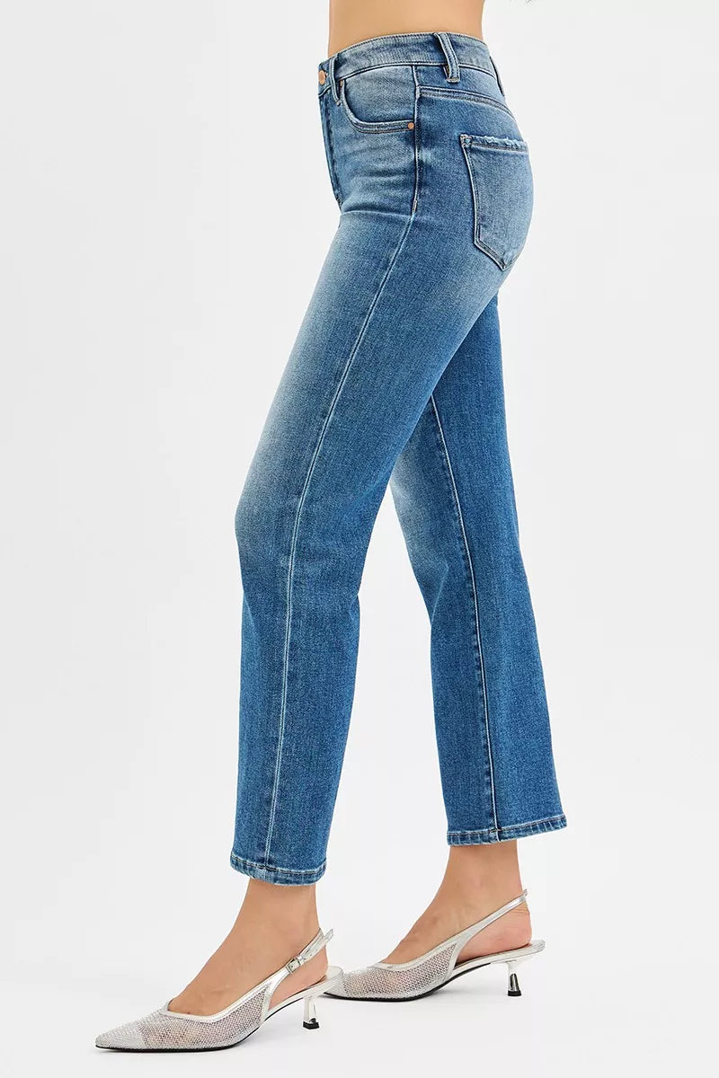 Medium-wash straight high-rise crop jeans, side view with contrast stitching