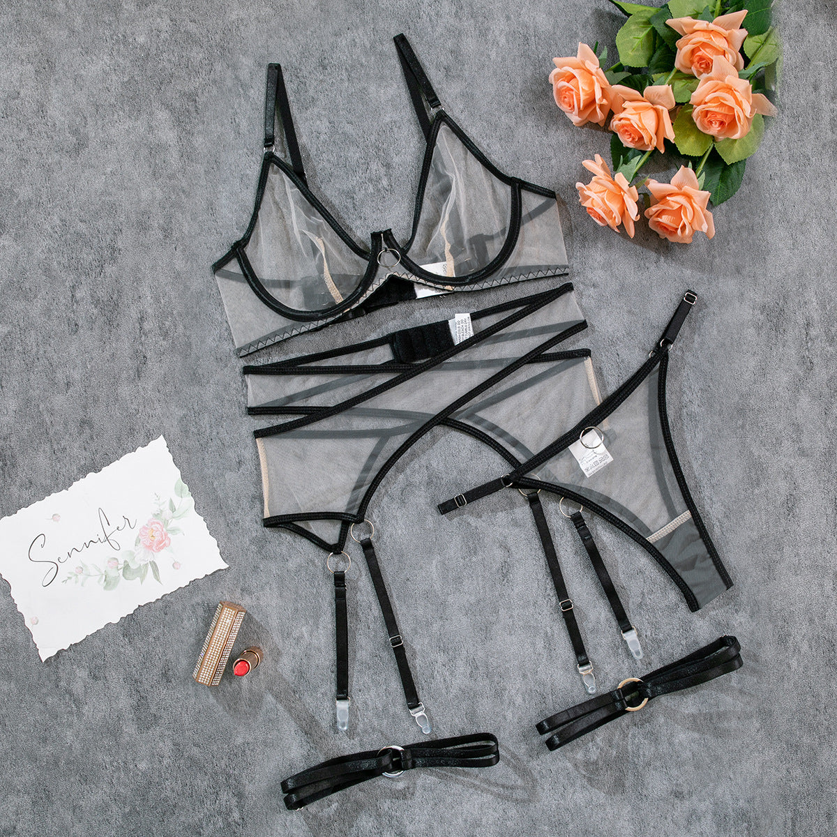 Black mesh underwear 4-piece set with bra, garter straps, and matching briefs