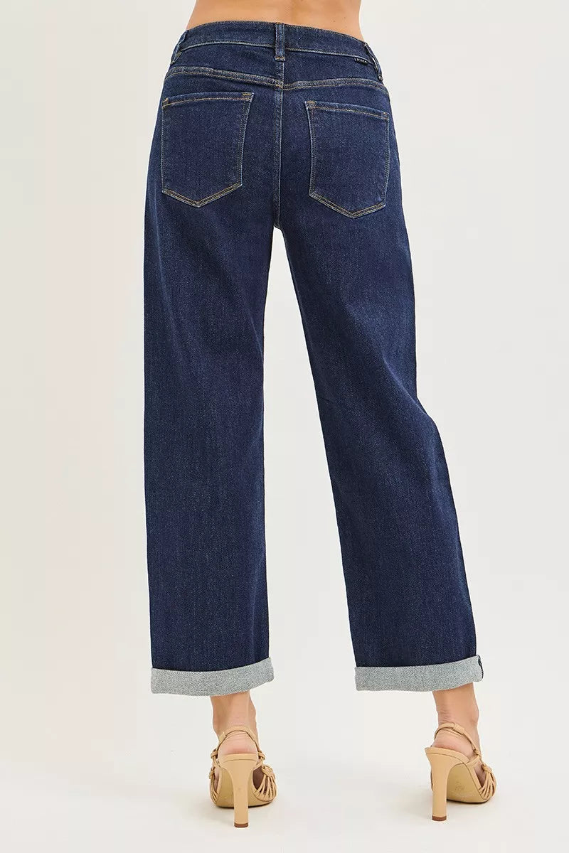 Dark blue boyfriend jeans with back pockets and cuffed hem