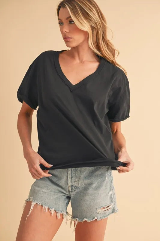 Black V-neck short-sleeve T-shirt, front view with gathered hem