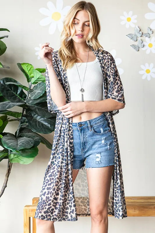 Taupe leopard open-front cardigan, relaxed short sleeves over a white ribbed top
