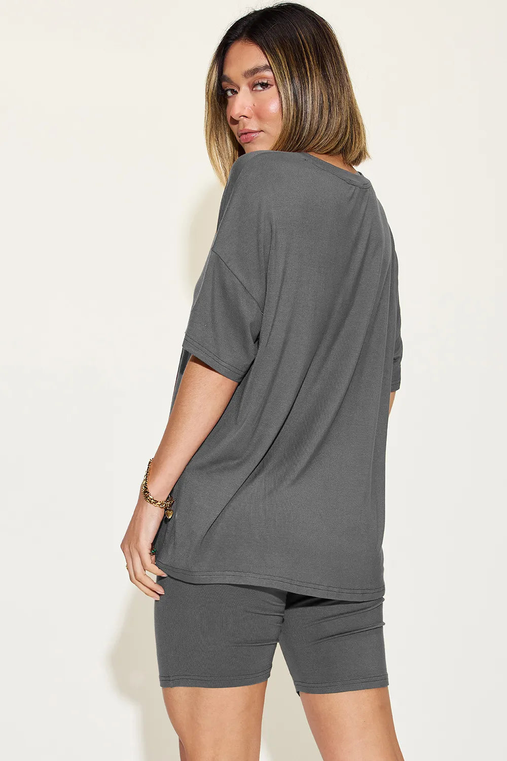 Dark gray T-shirt set with V-neck and matching shorts, back view