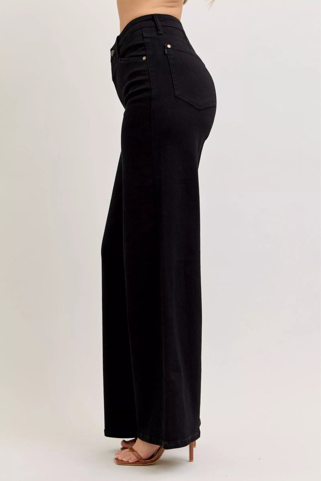 Back view of high-waisted wide-leg jeans in black with back yoke