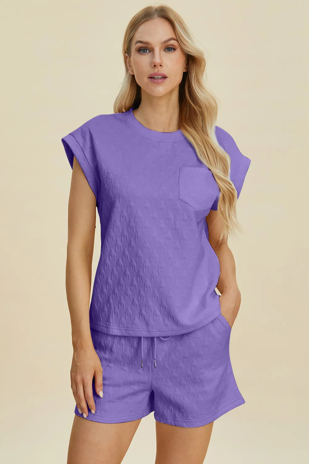 Lavender textured round-neck top with chest pocket and matching shorts set