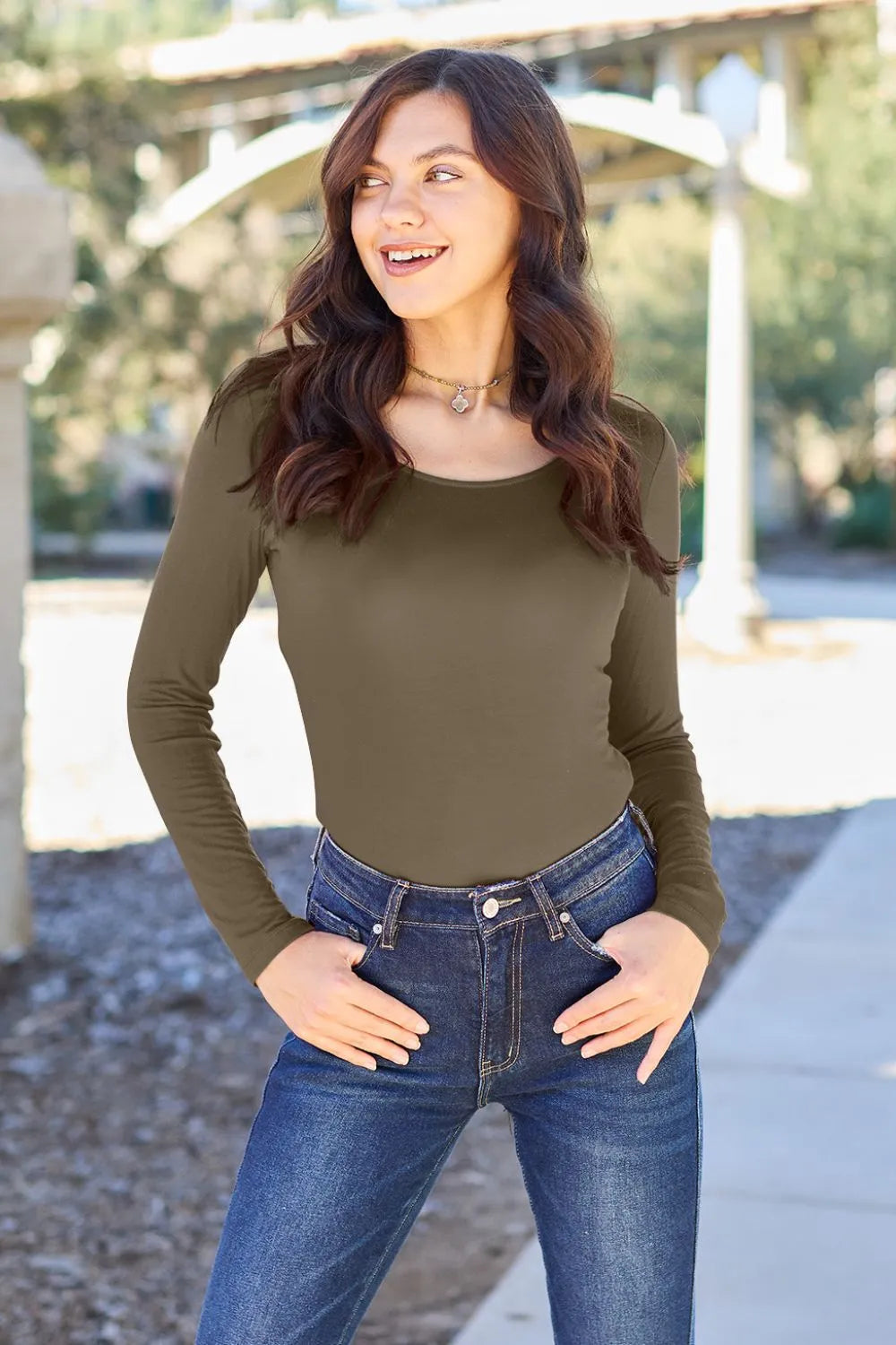 Round neck long sleeve bodysuit in olive green, front view