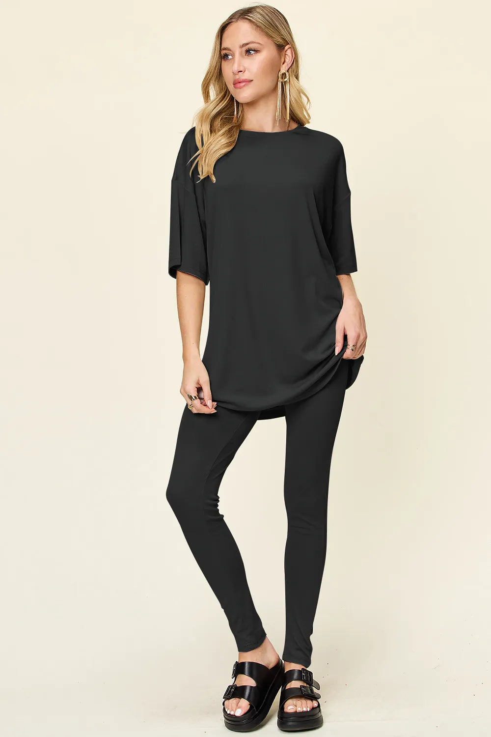 Black round neck T-shirt and leggings set, dropped shoulders