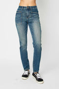 Dark high-waist skinny jeans—front patch pockets, button closure, belt loops