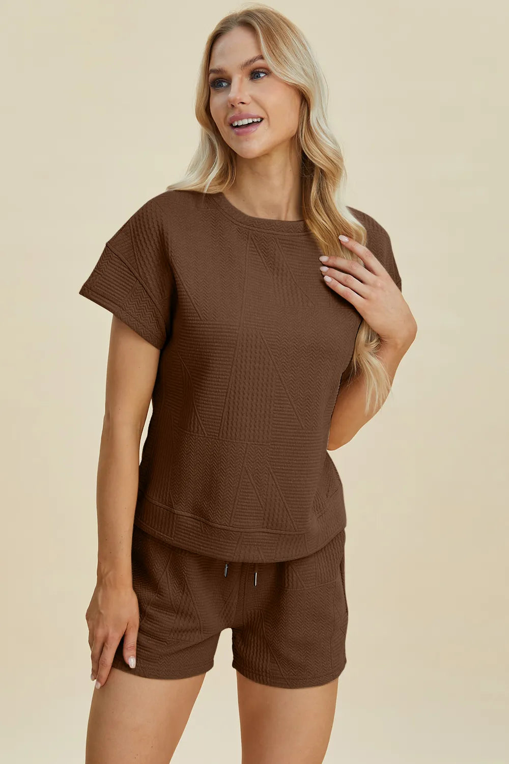 Brown textured short-sleeve top and drawstring shorts set, front view.