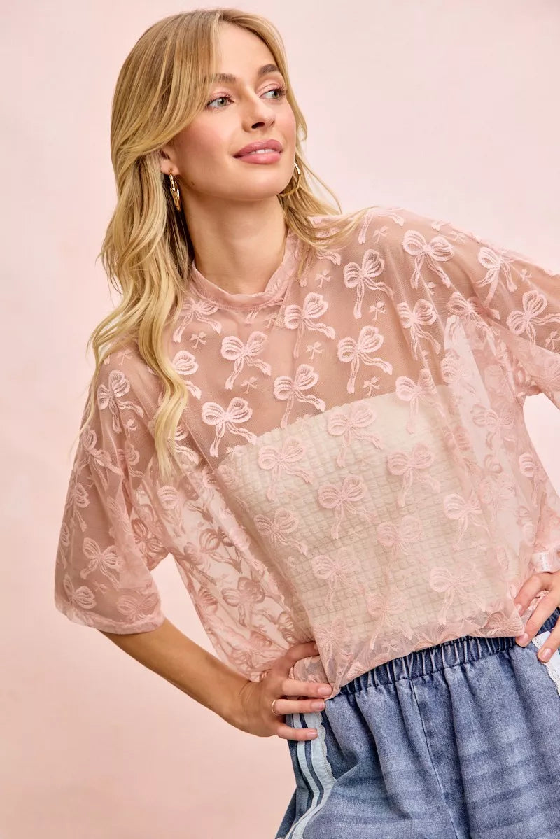 Dusty rose embroidered bow-pattern mesh top, relaxed boxy fit, short sleeves