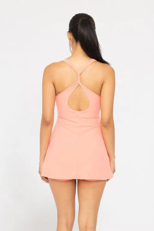 Vestido MONO B rosa melón espalda cruzada racerback con tirantes tipo X y vuelo