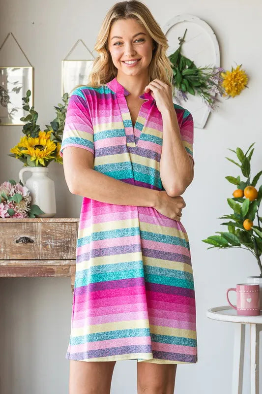 Pink multi striped mini tee dress with short sleeves and button polo neckline