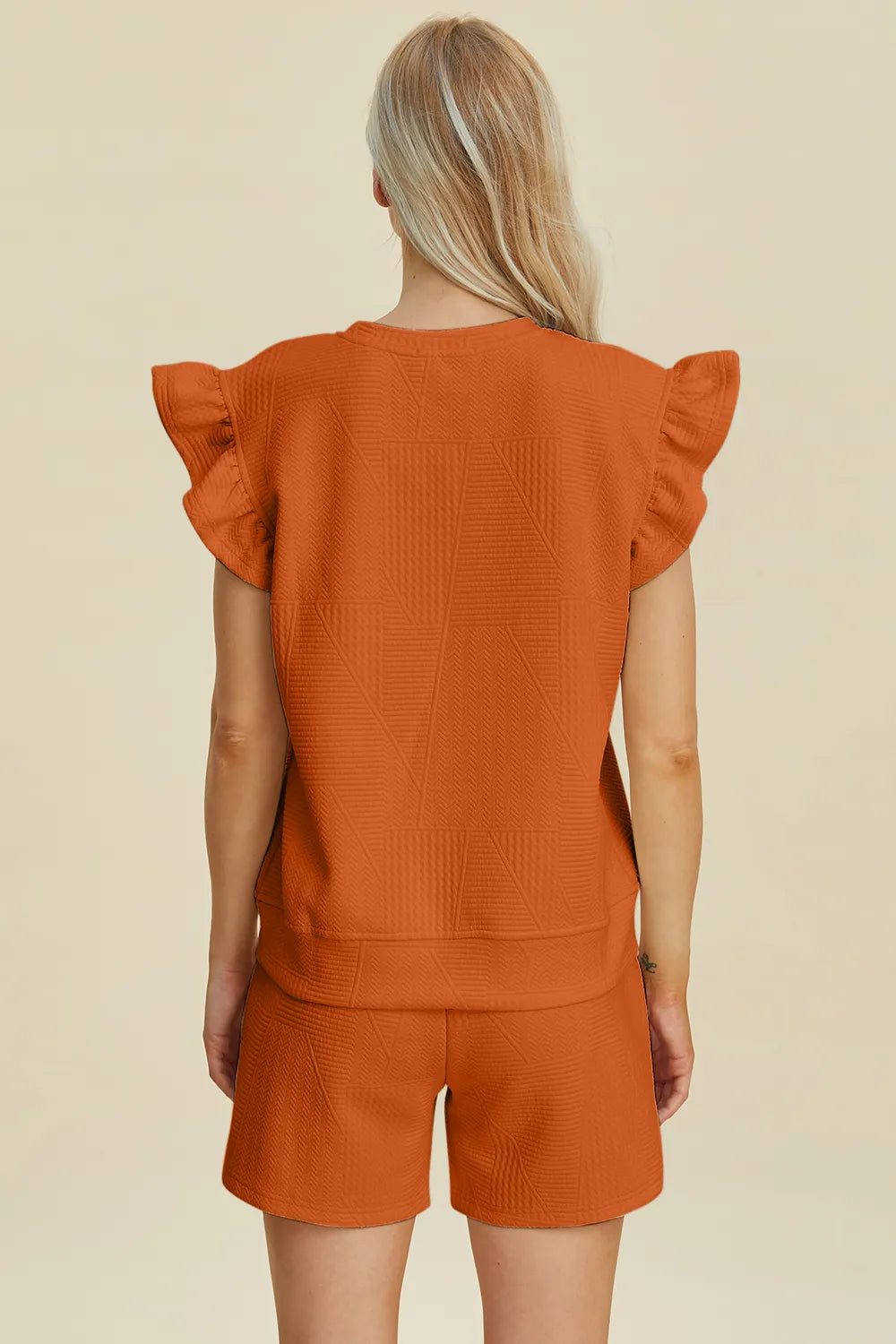 Orange textured top and shorts set, round neck and ruffle cap sleeves
