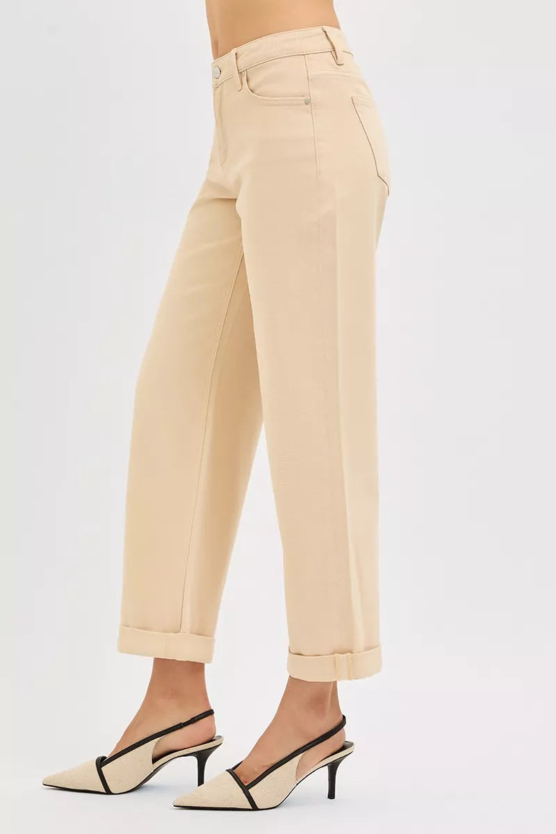Back view of butter milk barrel relaxed ankle jeans, tapered barrel leg, cuffed hem